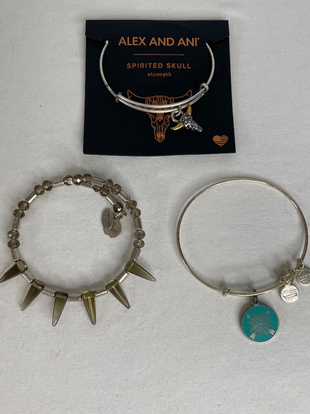 3 Alexi & Ani Bracelets